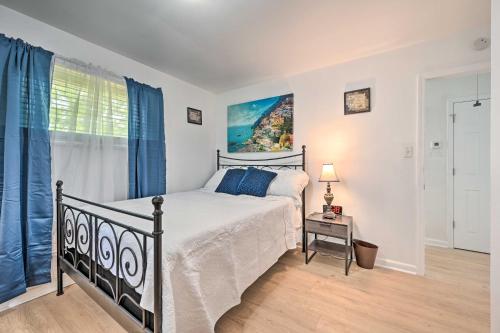 a bedroom with a bed and a window at Greensboro Home Less Than 4 Mi to Downtown! in Greensboro