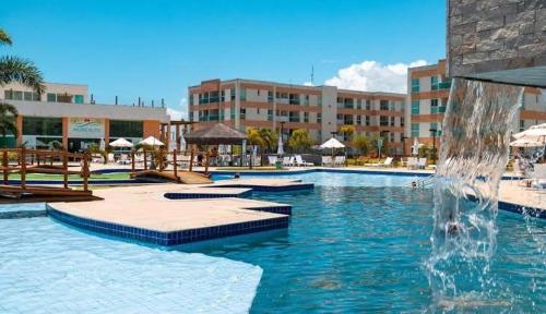 Bazén v ubytování Flat Muro alto clube nebo v jeho okolí