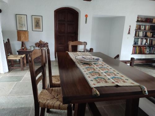 a dining room table with a table cloth on it at Lito's dream villa by the sea! in Amaliápoli