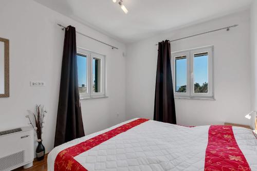 Posteľ alebo postele v izbe v ubytovaní Holiday Home Berulia