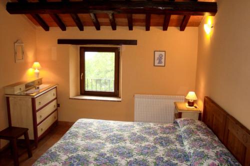 Ένα ή περισσότερα κρεβάτια σε δωμάτιο στο Agriturismo Semidimela