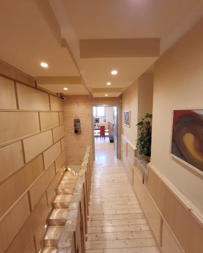 a hallway of a building with a long corridor at ArcHome in Pompei