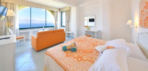 Postel nebo postele na pokoji v ubytování Paradiso Terme Resort & SPA con 5 piscine termali