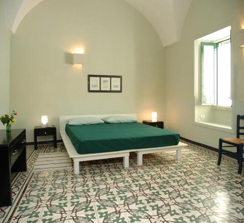 Postel nebo postele na pokoji v ubytování B&B di Pino Conte