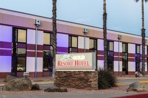 a sign in front of a resort hotel at Apache Gold Resort Hotel & Casino in Globe