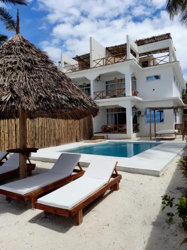 Πισίνα στο ή κοντά στο Coco Rise Villas - by Hostly