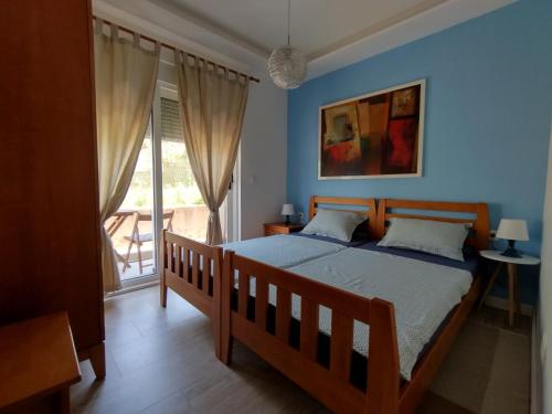 Кровать или кровати в номере FINI 2