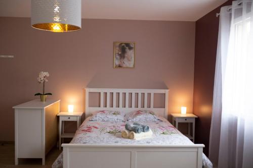 Posteľ alebo postele v izbe v ubytovaní LOC TROTTEUR LE PIVOINE Studio Grand confort, Gare SNCF de Lourdes