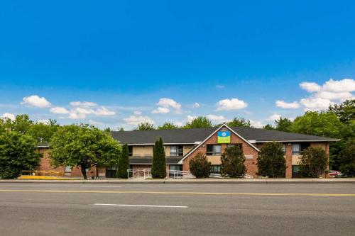 a building on the side of a road at SureStay Hotel by Best Western Lewiston in Lewiston