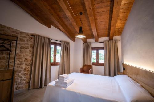 Postel nebo postele na pokoji v ubytování Casa Ronda