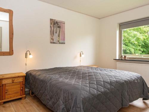 Postel nebo postele na pokoji v ubytování Holiday home Struer XXIII