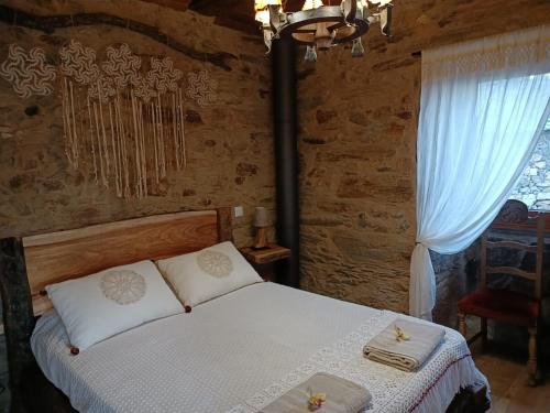 Postel nebo postele na pokoji v ubytování Casa da Ana - Um refúgio na montanha