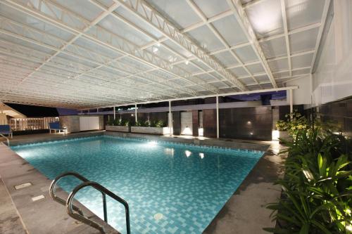 The swimming pool at or close to Ginger Kochi MG Road