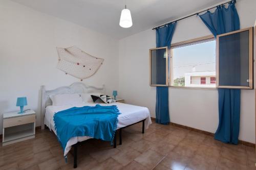 Posteľ alebo postele v izbe v ubytovaní Casa Franci Torre dell'Orso