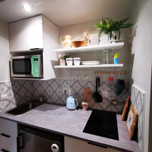Kuchyňa alebo kuchynka v ubytovaní Mini house
