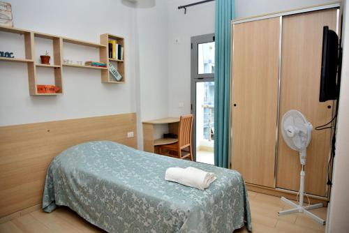 Postel nebo postele na pokoji v ubytování Arianiti Guesthouse