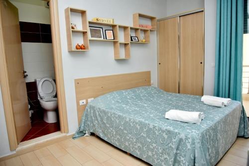 Postel nebo postele na pokoji v ubytování Arianiti Guesthouse