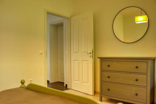 Postel nebo postele na pokoji v ubytování Mi Kertünk Apartman