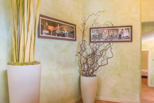 TV a/nebo společenská místnost v ubytování Hotel Antichi Cortili