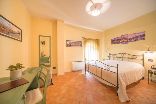 Postel nebo postele na pokoji v ubytování Hotel Antichi Cortili