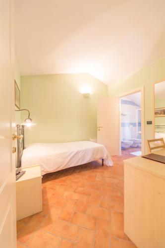 Postel nebo postele na pokoji v ubytování Hotel Antichi Cortili