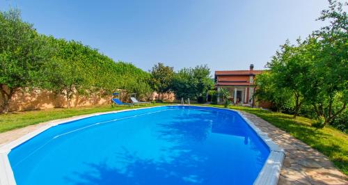 Foto Holiday Home Narona 2