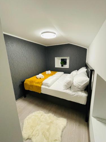 Postel nebo postele na pokoji v ubytování Vanadium house