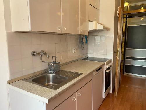 Kuchyň nebo kuchyňský kout v ubytování Apartment No. 9