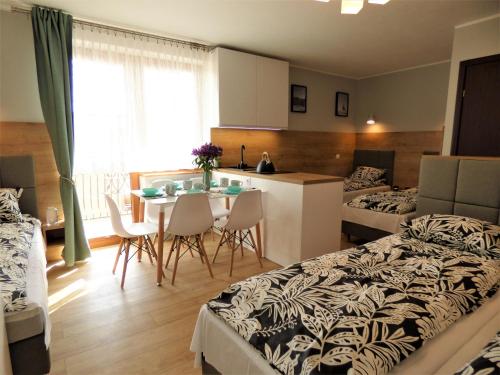 Kuchyň nebo kuchyňský kout v ubytování Mila