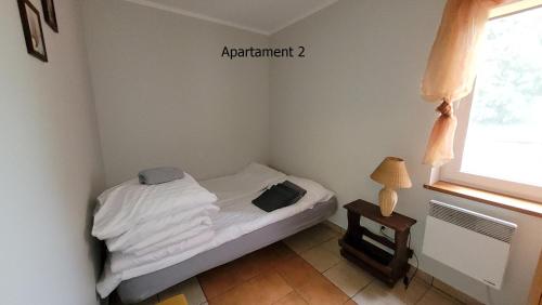 Ліжко або ліжка в номері Apartament Rybacka 84/2