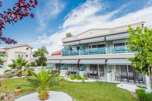 Κήπος έξω από το Dream Boutique Apartments