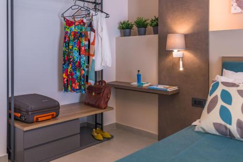 Postel nebo postele na pokoji v ubytování Macramè Fazello Rooms