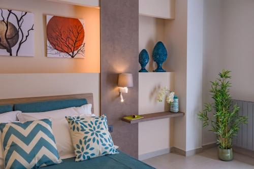 Postel nebo postele na pokoji v ubytování Macramè Fazello Rooms