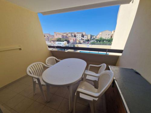 Photo de la galerie de l'établissement Appartement cosy 2 pièces avec cabine, terrasse et piscine, près de la plage à Marseillan - FR-1-326-674, à Marseillan