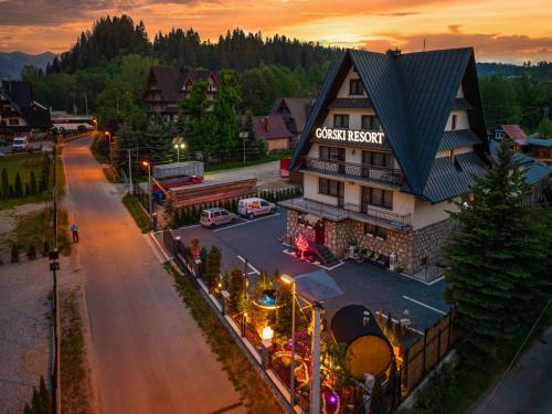 an overhead view of a building in a town at GORSKI RESORT Lux Apartments Jacuzzi & Sauna in Poronin