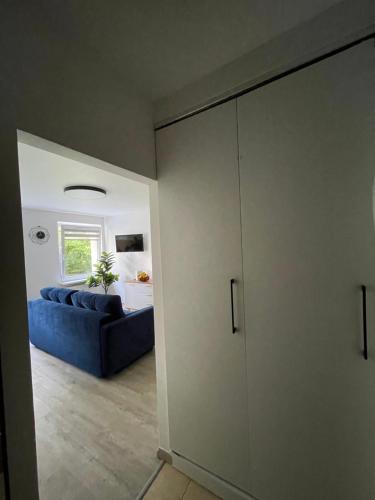 Ένα ή περισσότερα κρεβάτια σε δωμάτιο στο Apartament Na Zatorzu