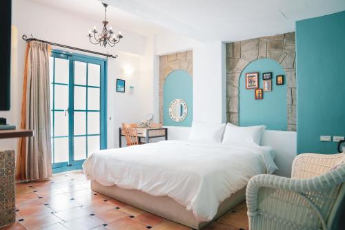 Postel nebo postele na pokoji v ubytování Bethlehem B&B Kenting