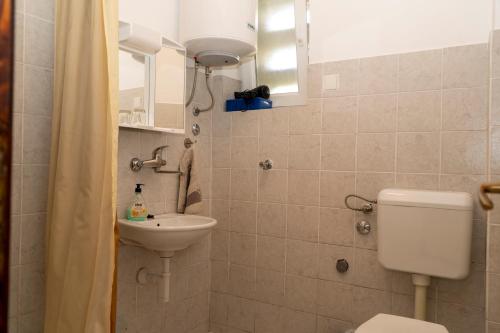 Koupelna v ubytování Apartman Čurčić