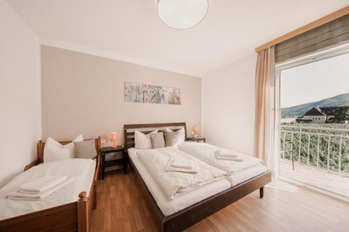 Ένα ή περισσότερα κρεβάτια σε δωμάτιο στο Donauschlössel