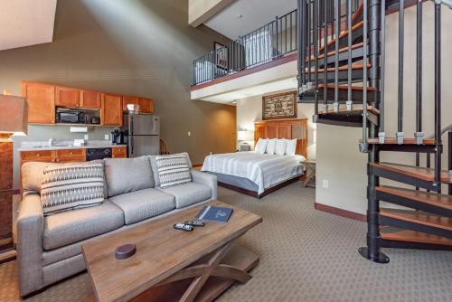a living room with a couch and a bed at A304 Studio & Loft Standard View in Oakland