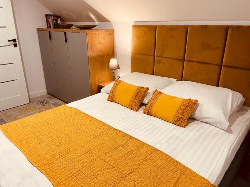 Łóżko lub łóżka w pokoju w obiekcie Haus am Meer Dziwnówek