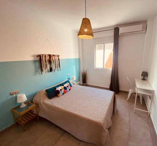 Postel nebo postele na pokoji v ubytování Apartamentos Chuita Playa
