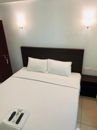 Cama o camas de una habitación en Apsara Residency
