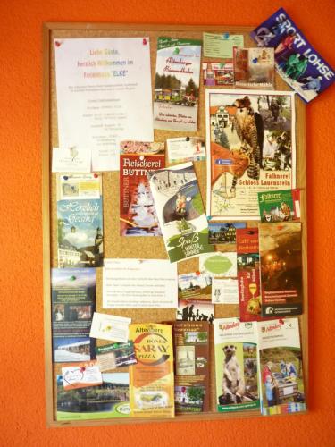 a collage of books on a wall at Ferienhaus Elke in Kurort Altenberg