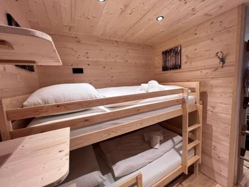 Poschodová posteľ alebo postele v izbe v ubytovaní Westendorf Mountain Lodge Appartement Kitzhorn