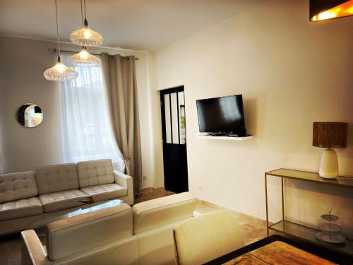 Μια τηλεόραση ή/και κέντρο ψυχαγωγίας στο VILLA SANDERLING au cœur de Saint Valery Haut standing 5 étoiles