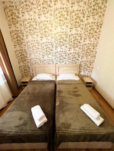 Кровать или кровати в номере Royal Galaxy apartment