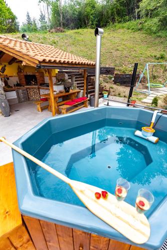 a hot tub with a boat inside of it at Rašpor in Rašpor