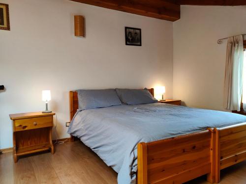Кровать или кровати в номере Appartamento Chatrian 2 CIR-TORGNON-0019