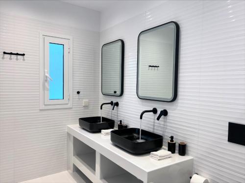 Photo de la galerie de l'établissement Adikri Villas & Suites, à Tourlos